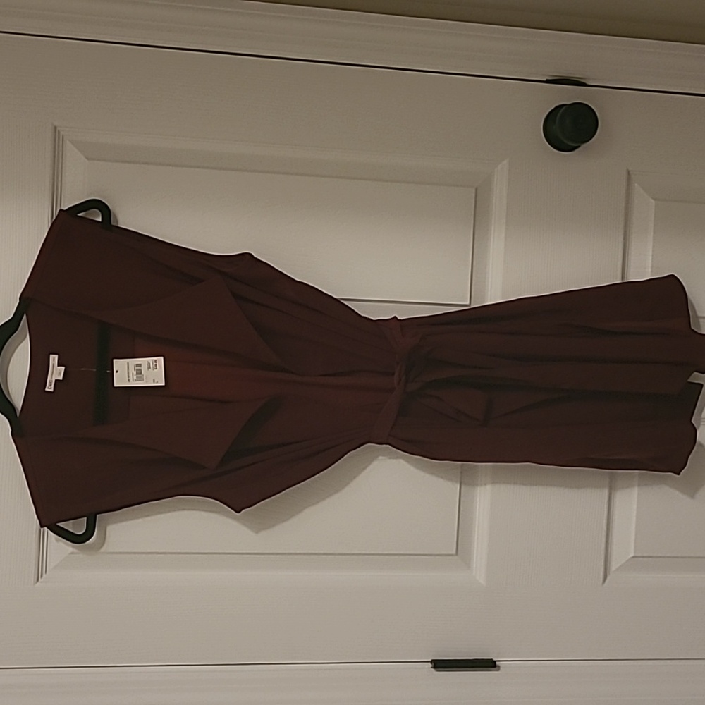 Never been used Burgundy vest size large from Cato